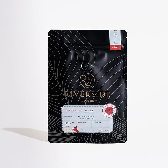 https://b2b.caffelleria.com/Riverside Coffee Dapper Dog Dark 50% Naturals Robusta Washed Arabica + 50% Coffee, Dark Roast 250 gm